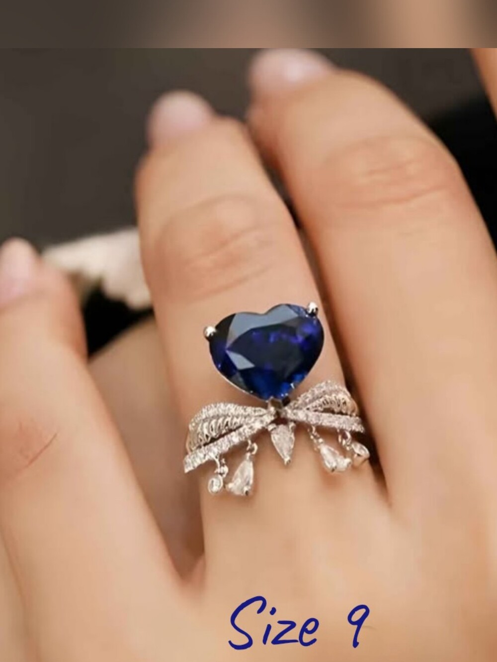 Gorgeous simulated Blue Sapphire heart dangling ring, Sz.9